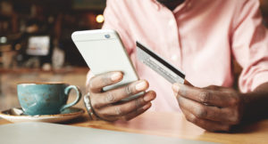Gentleman Using His Phone For eCommerce Purchases